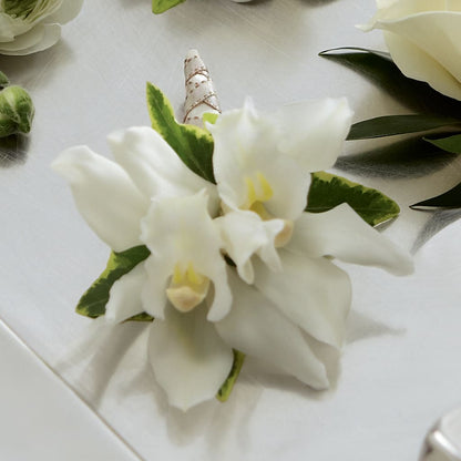 White Mini Cymbidium Boutonniere – M & A FLOWERS AND EVENTS, South Gate CA